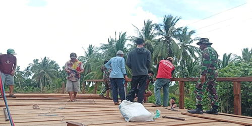 Senyum Bangga Satgas TMMD Bersama Warga